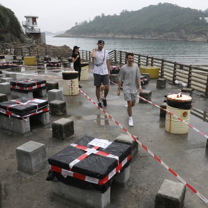 Red-and-white tape cordons off a barbecue site at Big Wave Bay in March. Photo: Dickson Lee