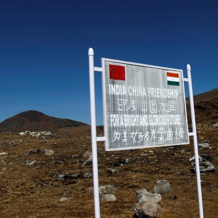 A signboard seen from the Indian side of the India-China border at Bumla in the northeastern Indian state of Arunachal Pradesh on November 11, 2009. The once-cordial relations between India and China appear set to deteriorate further with India’s use of the Tibet card and China’s steadfast refusal to see India as an equal. Photo: Reuters