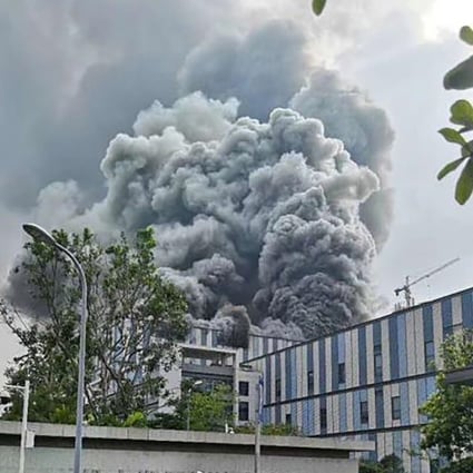 Thick plumes of smoke are seen coming out of a building at a Huawei Technologies complex in the city of Dongguan, in southern Guangdong province, that caught fire on Friday afternoon. Photo: Weibo