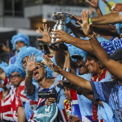 Fijian fans celebrate after Fiji wins the Cup final match against France on the last day of the 2019 Hong Kong Sevens. Photo: Sam Tsang