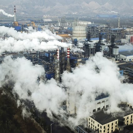 Smoke and steam rise from a coal processing plant in Hejin in central China’s Shanxi province. Chinese President Xi Jinping has said China will aim to stop pumping additional carbon dioxide into the atmosphere by 2060. Photo: AP Photo
