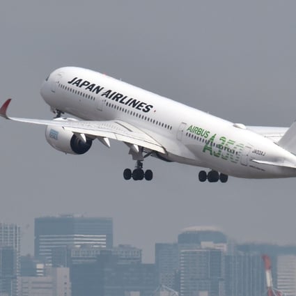 Japan Airlines is ditching the phrase ‘ladies and gentlemen’ in announcements made in flights and by staff at airports from October. Photo: AFP