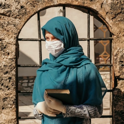 Wearing a mask is mandatory – but not always comfortable when you wear a hijab. Photo: Shutterstock
