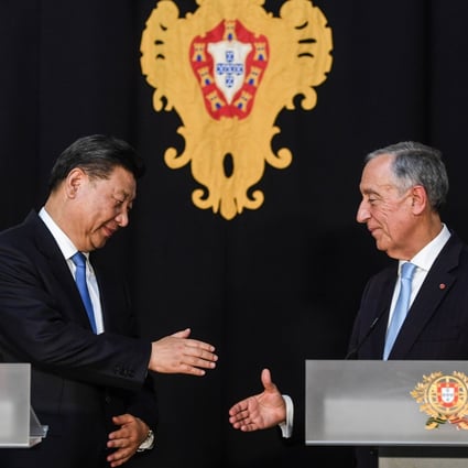 Portuguese President Marcelo Rebelo de Sousa shakes hands with Chinese leader Xi Jinping in Lisbon in 2018. Washington’s ambassador in Lisbon described Portugal as part of a “battlefield” between the US and China. Photo: AFP