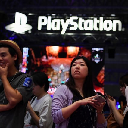 The Sony PlayStation logo is seen on the exhibition floor during the Tokyo Game Show on September 12, 2019. Photo: AFP