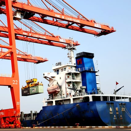 An oceangoing freighter loads containers at a port in Lianyungang, in eastern Jiangsu province, on September 7. While the contribution of exports to China’s growth formula has shrunk over the years, they are still expected to play an important role in the country’s “dual circulation” strategy. Photo: Xinhua