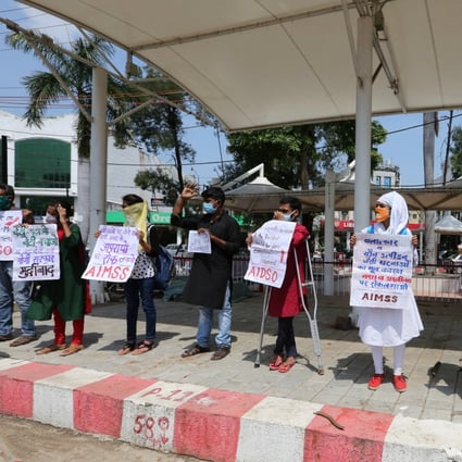 Indian activists protest against an alleged gang rape of a 19-year-old Dalit woman in Bhopal. Photo: EPA
