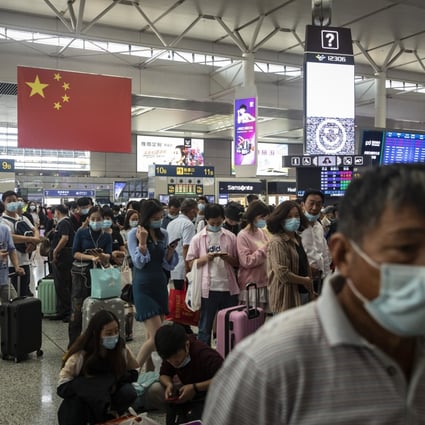 Passengers wait in the departure hall of Hongqiao High-speed Railway Station in Shanghai, China, on Wednesday. Photo: Bloomberg