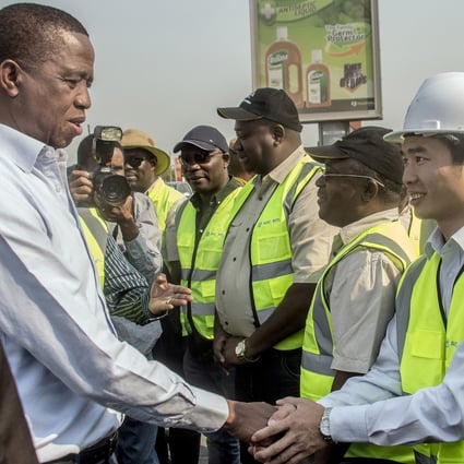 Zambian President Edgar Lungu meets workers from Aviation Industry Corp of China in 2018. Photo: AFP