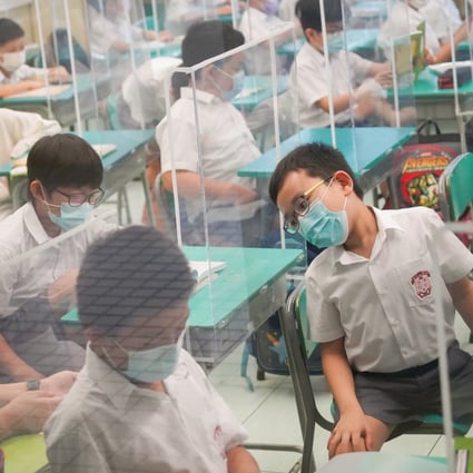 Students return to in-person classes at a primary school in Cheung Sha Wan on September 29. Nearly 900,000 pupils from all Hong Kong schools and kindergartens have returned to in-person classes for the first time in more than half a year amid the Covid-19 pandemic. Photo: Winson Wong
