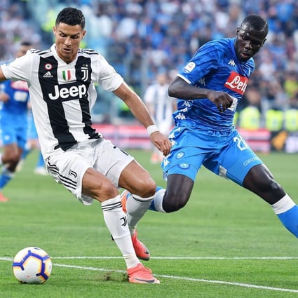 Juventus' Cristiano Ronaldo (left) and Napoli's Kalidou Koulibaly in action during their 2018 Italian Serie A match. Photo: EPA