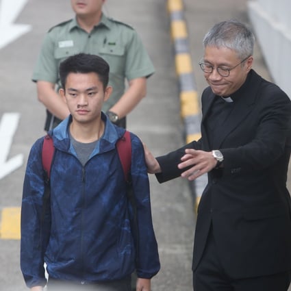 Murder suspect Chan Tong-kai (left) with Reverend Peter Koon Ho-ming after being released a year ago. Photo: Winson Wong