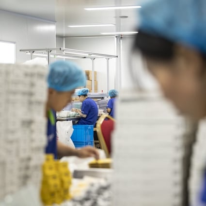 Employees work on a production line at the Yangzhou Shuguang Toothbrush Factory in Yangzhou, Jiangsu province, China, on September 21. As export orders started plummeting in March amid the coronavirus’ global spread, the Chinese toothbrush maker turned to the domestic market. With the help of Alibaba Group’s huge trove of data on what Chinese consumers are searching for, the company shifted to making products that became local hits. Photo: Bloomberg