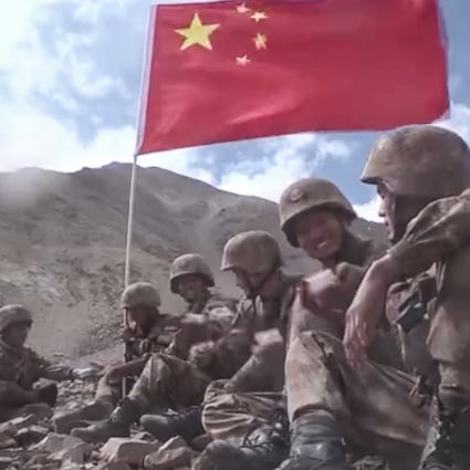 Troops are seen sharing mooncakes after a border patrol in the latest PLA video. Photo: Weibo