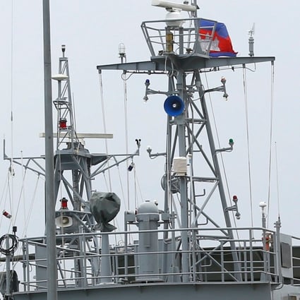 Sailors stand guard near patrol boats at Ream Naval Base in Sihanoukville, Cambodia in July 2019. Photo: Reuters