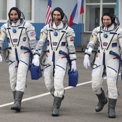 US astronaut Chris Cassidy, left, Russian cosmonauts Anatoly Ivanishin, centre, and Ivan Vagner, prior to their launch in April. File photo: AP