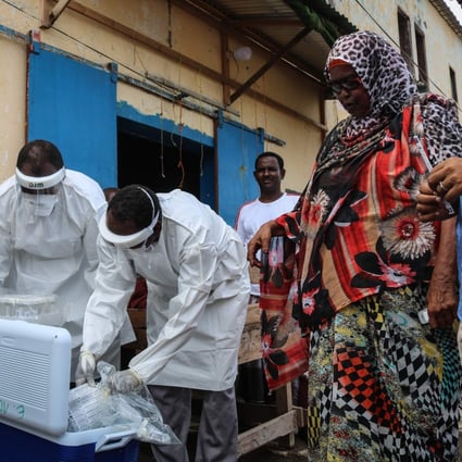Health ministry workers carry out mass testing for the coronavirus in Djibouti in May. Photo: AFP