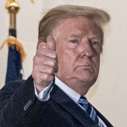 US President Donald Trump gives a thumbs-up after returning to the White House on Monday following several days at Walter Reed National Military Medical Center. Photo: EPA-EFE