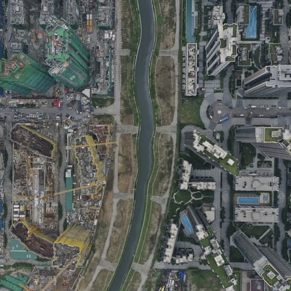 An aerial view of the Kai Tak Nullah, one of the main drainage channels for the Kowloon East area, where experts suggest testing sewage for Covid-19 should begin. Photo: Sam Tsang