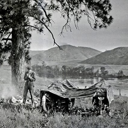 Carl Stearns Clancy taking a break by the Clark Fork River in Montana, in the US, in 1913, on his round-the-world journey. Photo: The Clancy Family Collection