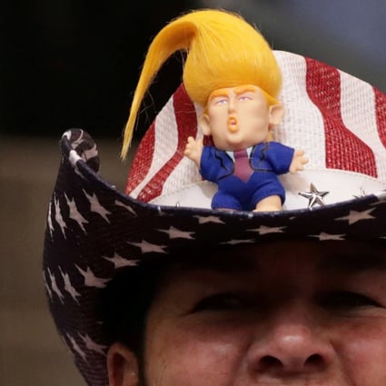 A Trump supporter at a rally in New Hampshire in February. Pro-democracy Hongkongers profess to support Trump despite his attacks on American democracy and refusal to condemn white supremacists. Photo: Reuters