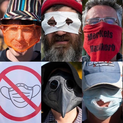 Portraits of people and placards from a protest against masks and virus restrictions Konstanz, southern Germany. Photo: AFP