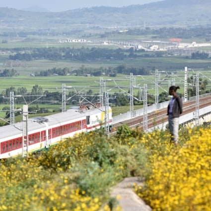 A train runs on the Ethiopia-Djibouti railway, which was built by Chinese firms. Private security contractors are working in a growing number of African nations to protect Chinese. Photo: Xinhua