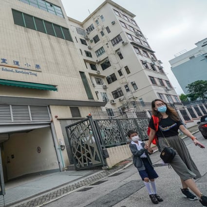 A student and his mother at Alliance Primary School in Kowloon Tong. Photo: Felix Wong