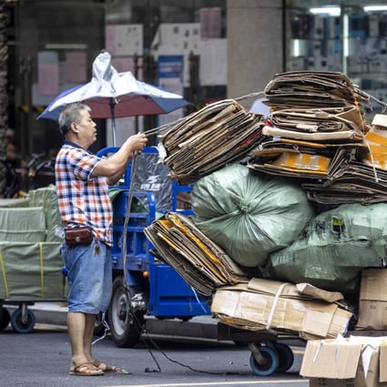 An elderly man loads a cart at a market in Guangzhou in China’s Guangdong province on June 10. Those aged 65 or over are projected to make up 14 per cent of the Chinese population by 2022. Photo: EPA-EFE