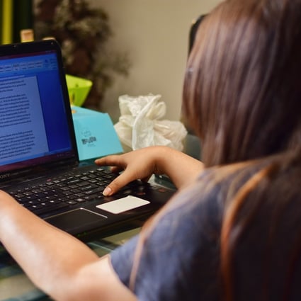 A woman works from home in Noida, in north India, after the Delhi government directed non-essential sectors to work from home. The demands of children and elderly relatives can make working from home challenging for some employees. Photo Illustration: LightRocket via Getty Images)