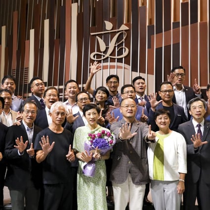 Opposition Legco members pose for a separate group photograph after the last session ended on July 17. In a sign of the deep rift, lawmakers refused to stand together for the traditional end-of-term photo. Photo: Dickson Lee