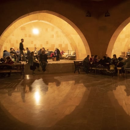 People take refuge in a bomb shelter in Stepanakert, Nagorno-Karabakh. Photo: AP