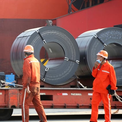 Workers load steel products for export onto a cargo ship at a port in Lianyungang, Jiangsu province, on May 27. The combination of China’s rapid economic recovery from the pandemic and its massive steel capacity could make relations with its trading partners even more fraught without some deft diplomacy. Photo: Reuters