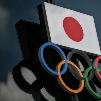 The Olympic Rings and the Japanese flag pictured outside the Olympic Museum in Tokyo. Photo: AFP