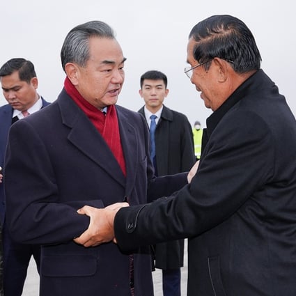 Chinese Foreign Minister Wang Yi greets Cambodian Prime Minister Hun Sen in Beijing on February 5, 2020. Photo: Xinhua
