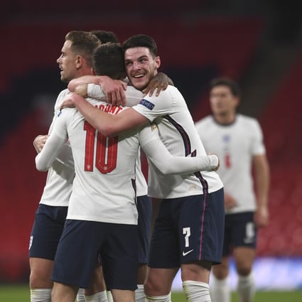 England’s Mason Mount (centre) celebrates with Declan Rice after scoring his side’s second goal during the Uefa Nations League win against Belgium. Photo: AP