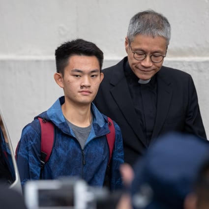 Murder suspect Chan Tong-kai leaves Hong Kong’s Pik Uk Correctional Institution with Anglican pastor Peter Koon by his side in October 2018. Photo: EPA-EFE