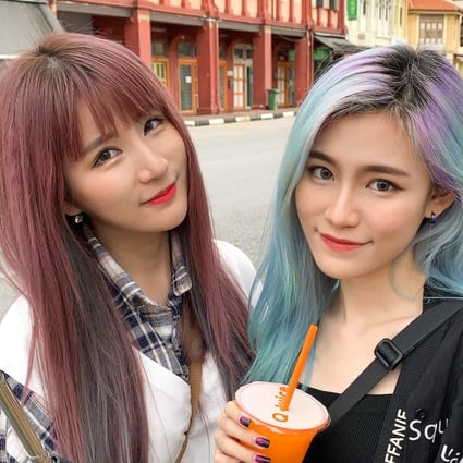 Singaporean sisters Tiffanie (left) and Michy Lim say they create videos in Mandarin to help other young people in the city state embrace the language. Photo: Tiffanie and Michy Lim