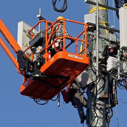A crew from Verizon installs 5G telecommunications equipment on a tower in Orem, Utah, on December 3, 2019. Conspiracy theories around the health effects of 5G frequencies have inspired fear among some people despite the lack of evidence those effects exist. Photo: Reuters