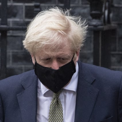 British Prime Minister Boris Johnson leaves 10 Downing Street to announce a three-tier coronavirus lockdown system in England. Photo: EPA-EFE