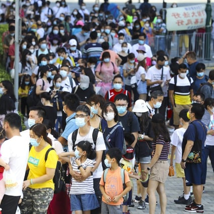 Crowds wait for a cable car ride in Tung Chung, during the long weekend celebrating National Day and the day following the Chinese Mid-Autumn Festival, on October 2. Photo: Dickson Lee
