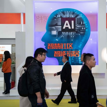 Visitors walk past an AI booth at the 14th China International Exhibition on Public Safety and Security in Beijing on October 24, 2018. Photo: AFP