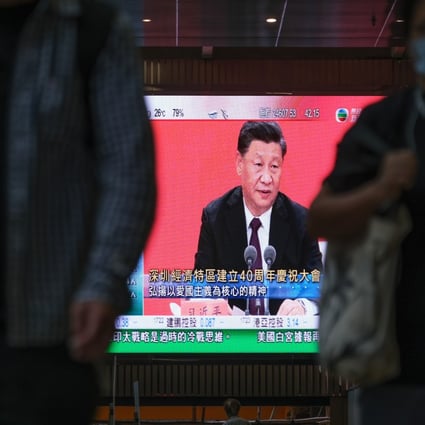 President Xi Jinping’s Shenzhen speech is shown on a public screen in Hong Kong. Photo: Bloomberg