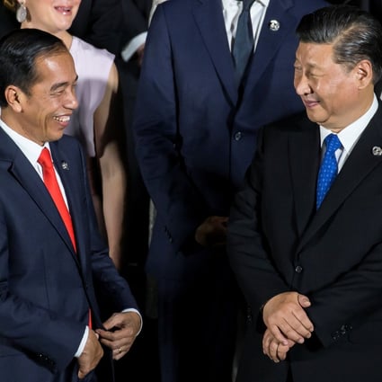 President Joko Widodo of Indonesia with President Xi Jinping of China at the G20 summit in Osaka in 2019. Indonesia has seen rapid investment by China under Widodo’s administration. Photo: Reuters