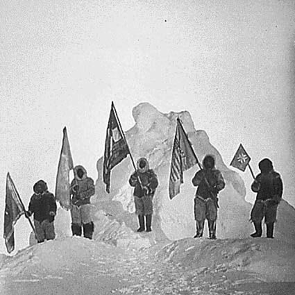 Matthew Henson (centre), holding the polar flag, and his Inuit colleagues at the North Pole. But it was Henson’s long-time friend Robert Peary who was recognised for the expedition. Photo: Public Domain