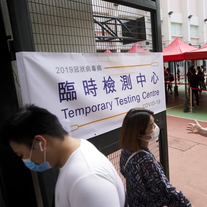People queue for a coronavirus test at the Yau Tsim Mong temporary testing centre. Photo: Winson Wong