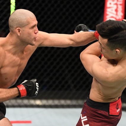 Brian Ortega punches ‘The Korean Zombie’ Jung Chan-sung in their featherweight bout during the UFC Fight Night event inside Flash Forum on UFC Fight Island on October 18, 2020 in Abu Dhabi, United Arab Emirates. Photos: Josh Hedges/Zuffa LLC via Getty Images