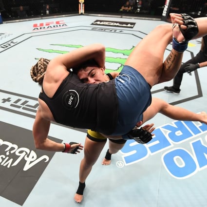 Jessica Andrade takes down Katlyn Chookagian in their women’s flyweight bout during UFC Fight Night inside Flash Forum on UFC Fight Island on October 18, 2020 in Abu Dhabi, United Arab Emirates. Photos: Josh Hedges/Zuffa LLC via Getty Images