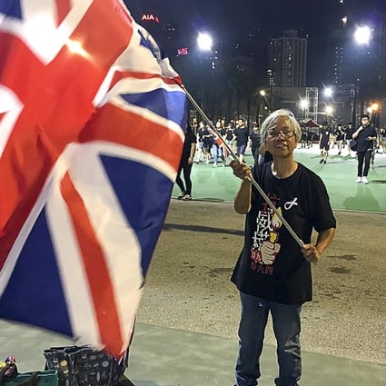 Alexandra Wong Fung-yiu poses with a Union flag in Victoria Park in June last year. Photo: SCMP