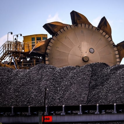 A bucket-wheel reclaimer sits next to a pile of coal at the port in Newcastle, Australia, on October 12. President Xi Jinping’s pledge to make China carbon neutral by 2060 and continued tensions between Beijing and Canberra have clouded the outlook for the Australian dollar. Photo: Bloomberg